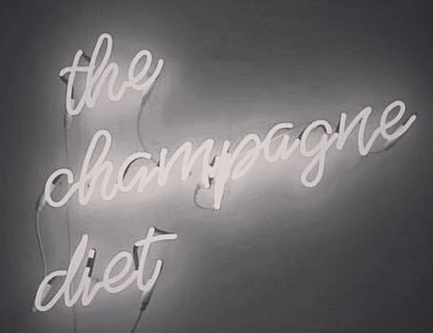 the champagne diet neon sign 