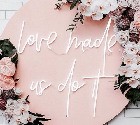 Love made us do it neon sign 